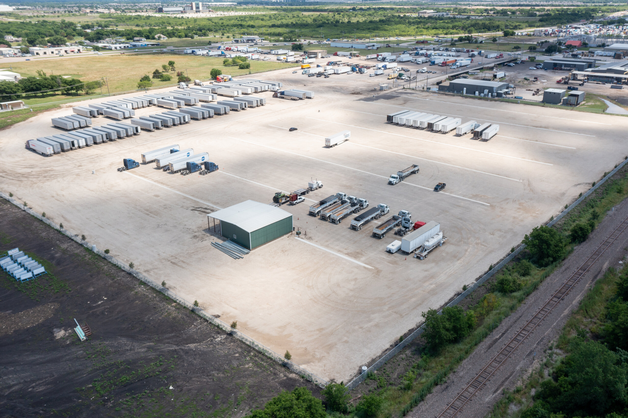 Secure fleet parking facility with American trucks
